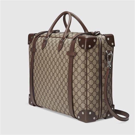 designer tas gucci|Gucci leather suitcase.